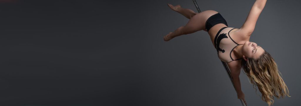 Woman spinning on pole